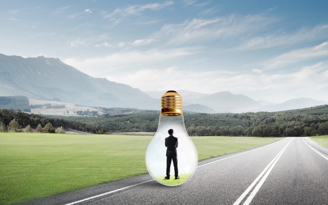 Man trapped in a light bulb on an empty stretch of highway.
